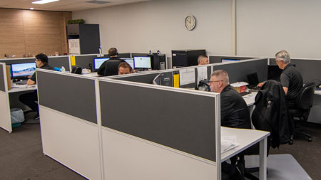 Cybernet Technicians working at their desks